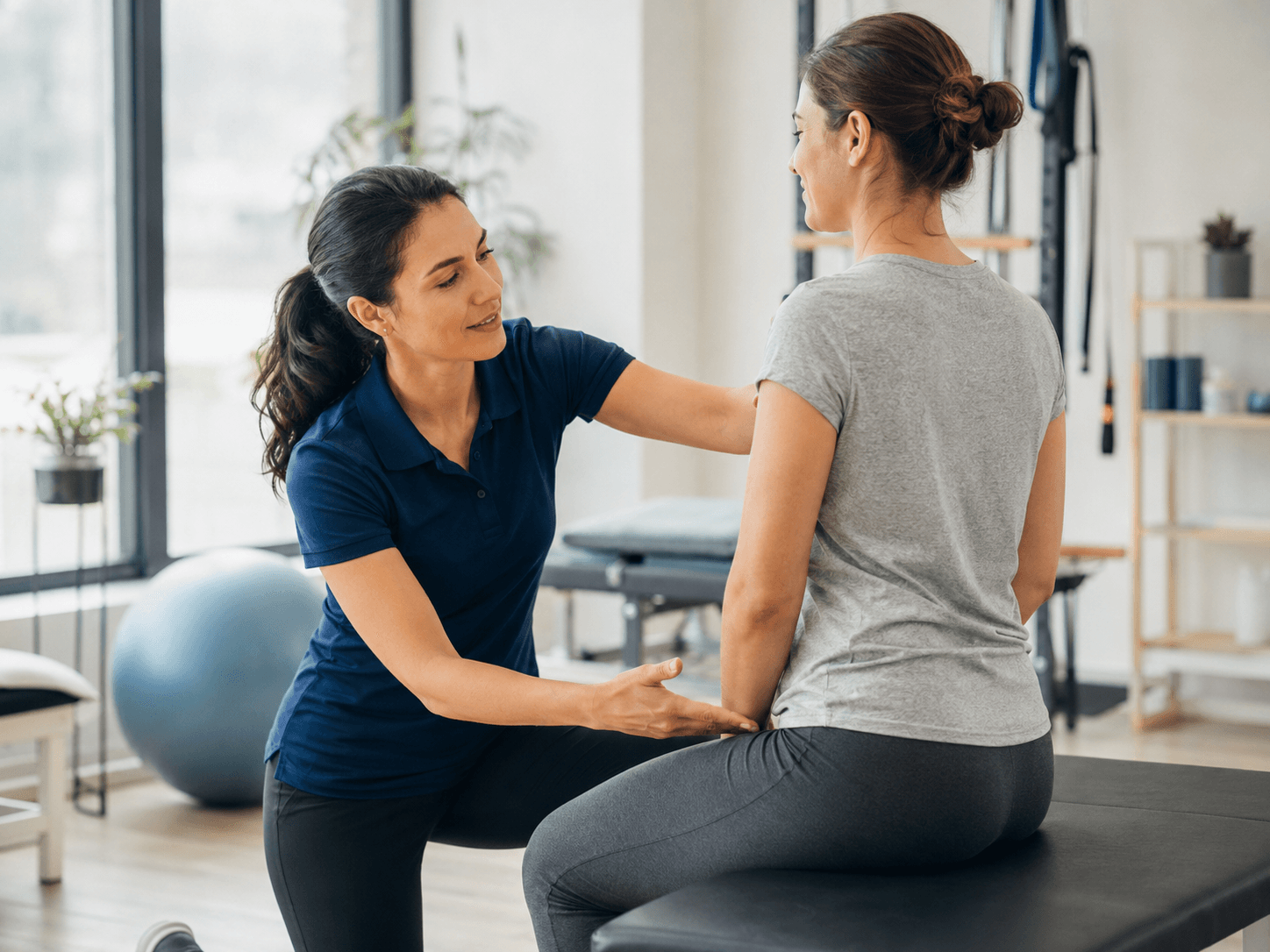 Physiotherapist explaining personalized treatment plan at MoveWell Ahmedabad